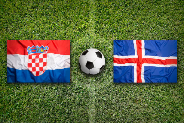 istock Croatia vs. Iceland flags on soccer field 647805006