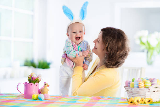 istock Mother and child celebrating Easter at home 647808840