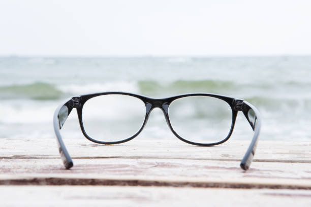 istock Eye Glasses on the sea background 647808962