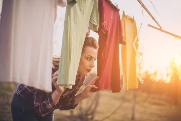 istock Girl has a laundry day outdoors 647809504
