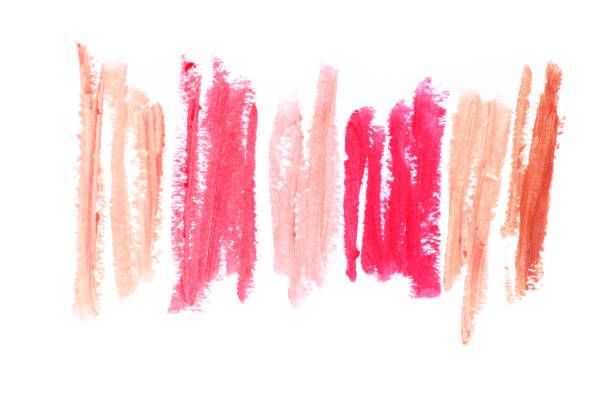 Set of colorful lipstick smudged smears isolated on white background. Top view point.