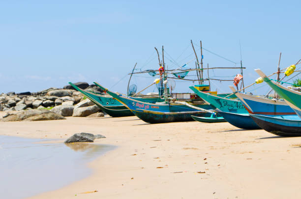 istock Fishing boat on the beach 647812562