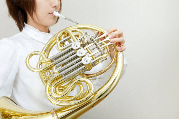 hand of Musician playing a brass instrument during a band parade