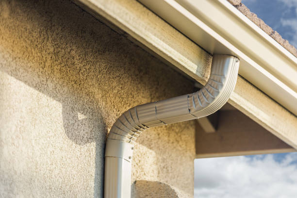 istock House with New Seamless Aluminum Rain Gutters. 647816012