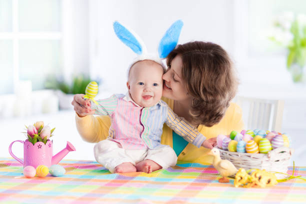 istock Mother and child celebrating Easter at home 647816968