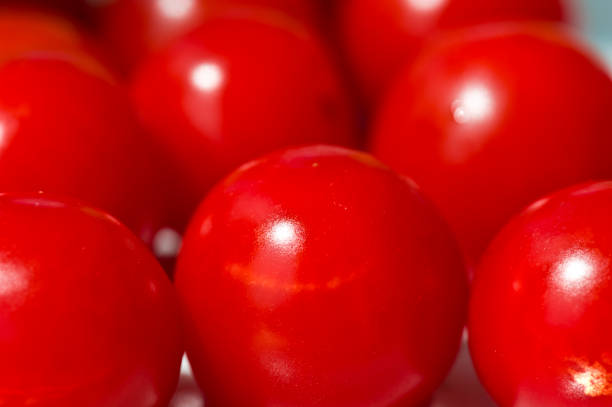 istock cluster of red cherry tomatoes 647817004