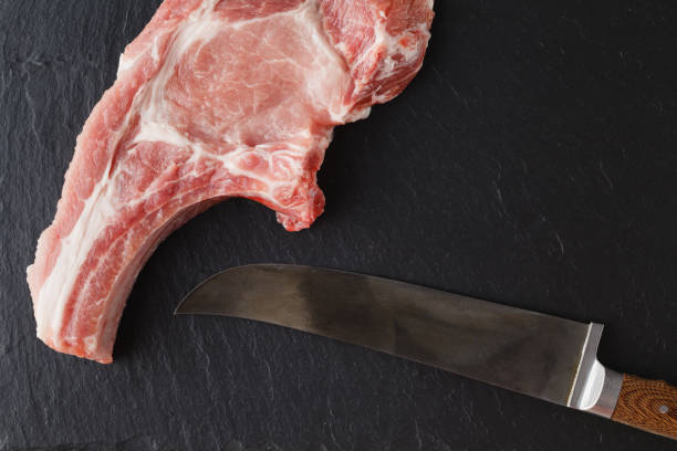 piece of fresh meat on slate surface