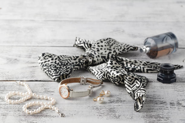 istock bijouterie pearl on white wooden table 647824466