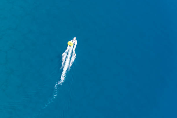 istock Aerial View of Parasailing 647824494