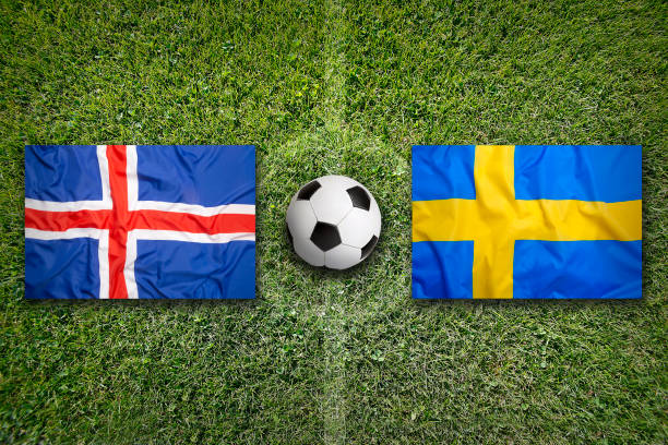 istock Iceland vs. Sweden flags on soccer field 647824496