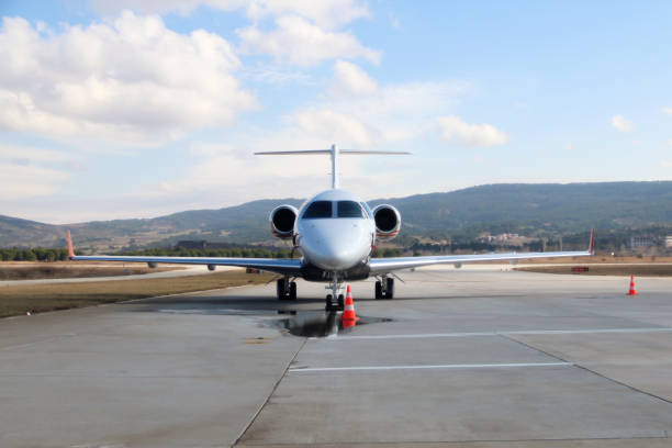 istock Private Jet On Airport Runway 647827538