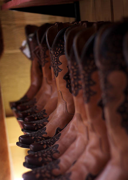 istock Row of Cowboy Boots 647827626