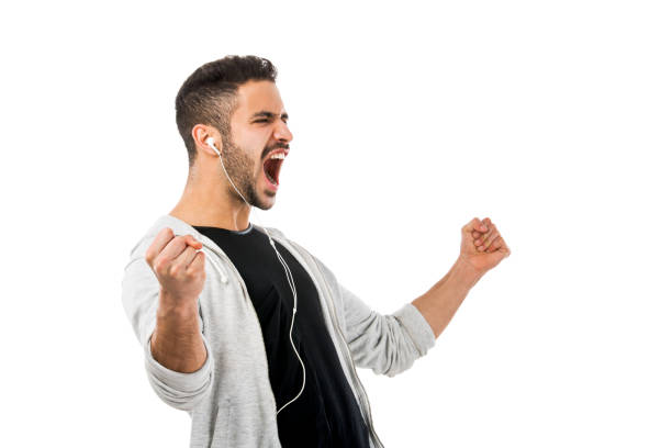 istock Man smiling and listen music 647830374
