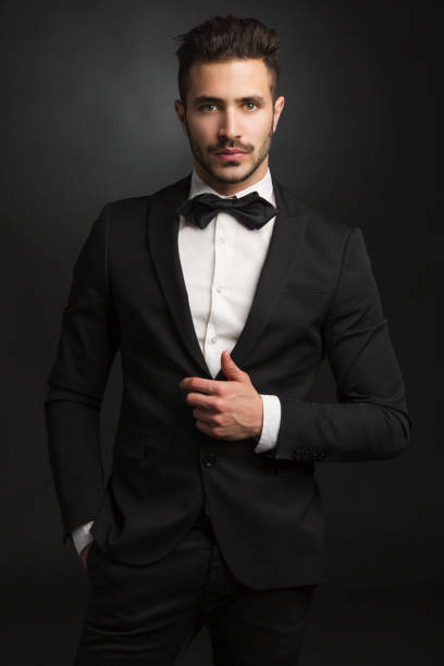 istock Latin man wearing a tuxedo 647830430