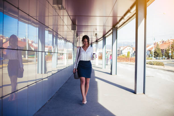 istock Businesswoman having a coffee break during a hard working day 647831244