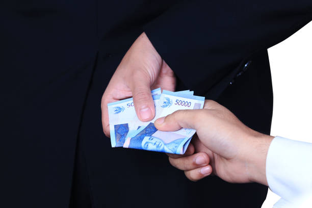 istock illustration bribe with money 647839420