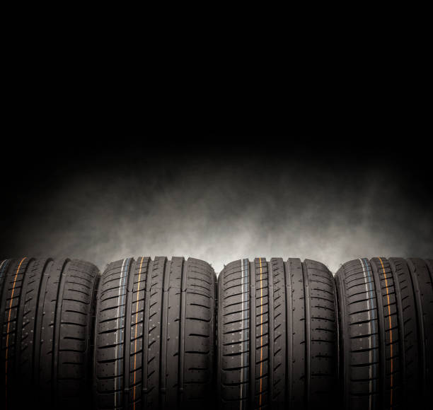 istock Car tires on a dark background. 647839874