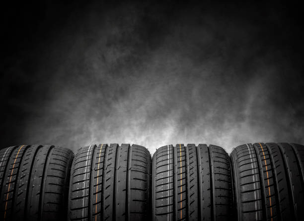 istock Car tires on a dark background. 647839986