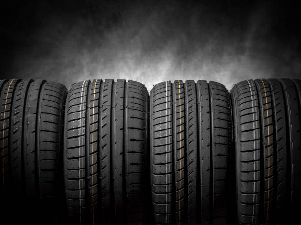 istock Car tires on a dark background. 647840078