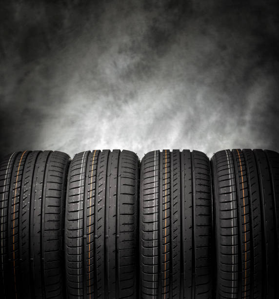 istock Car tires on a dark background. 647840212