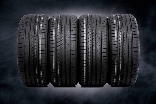 istock Car tires on a dark background. 647840282