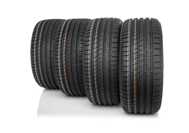 istock New car tires isolated on white background. 647843038
