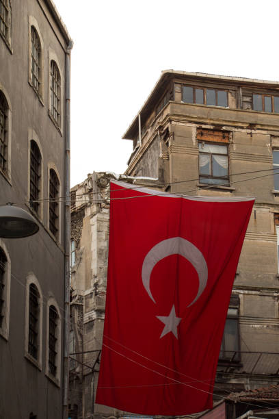 istock Turkish national flag hang on a rope in a building 647845142