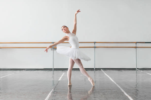 istock Beautiful ballerina rehearsal in ballet class 647845158
