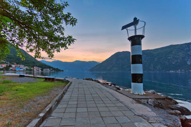 istock Sunset on the sea with mountains 647858666