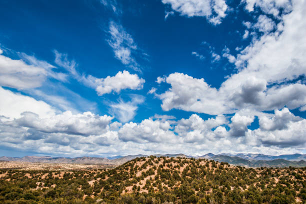 istock Blue Sky and Fluffy Clouds over Southwest Landscape 647865176