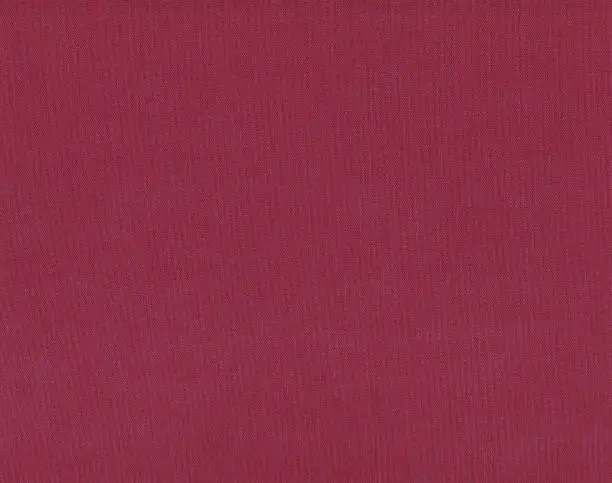 Dark red textile material. Dark red wine background