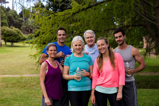 istock Group of people together in park 647871312