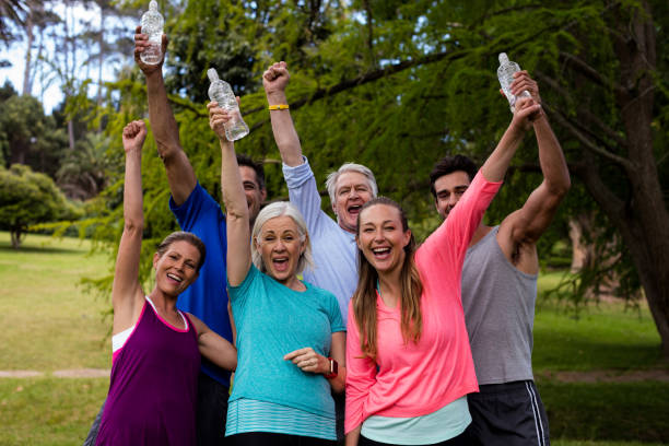 istock Group of people together in park 647871488