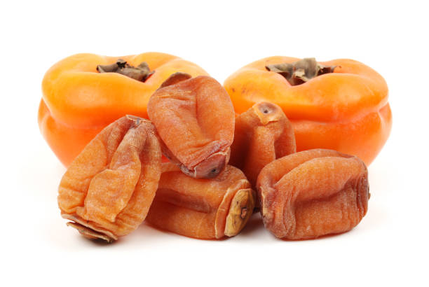 istock Dried persimmon  and Fresh persimmon on white background 647872408