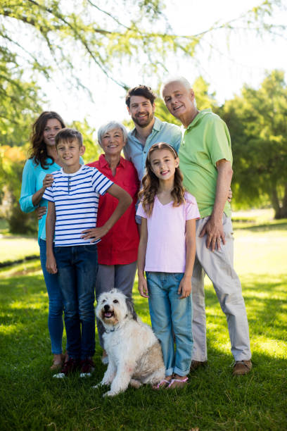 istock Happy family enjoying in park 647874864