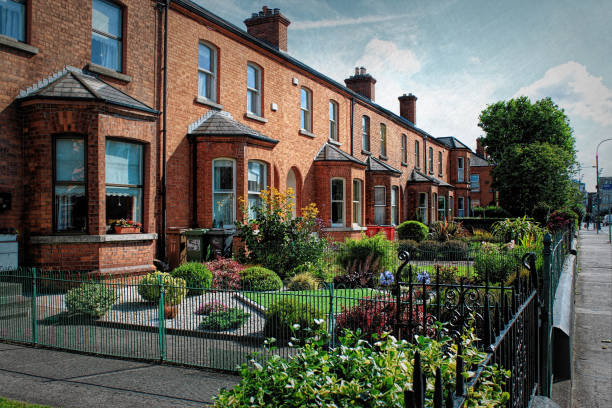 Mews in Brooklyn. Rows or courtyard of apartment buildings with lawn and trees in the middle