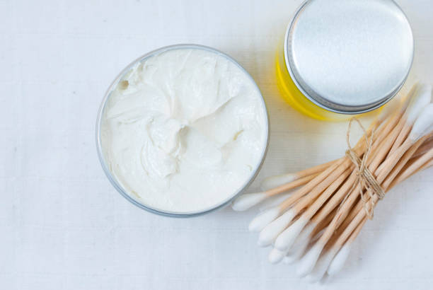 istock Q-tips, cream and oil 647882372