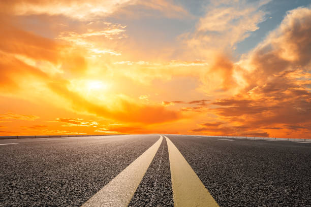 istock Asphalt road and sky at sunset 647956160