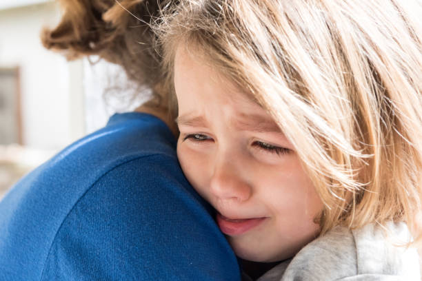 istock Little girl crying 647957636