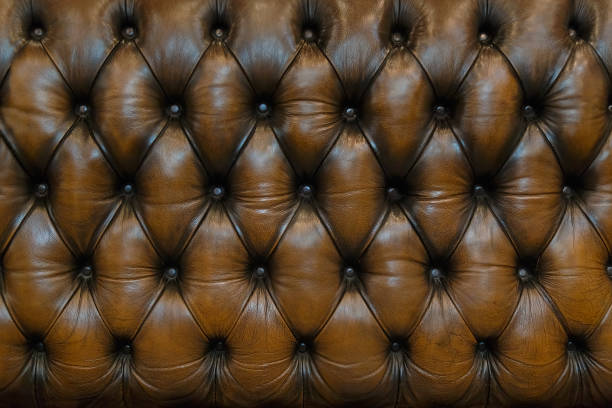 istock Genuine Luxury Brown Leather Upholstery Background 647958706