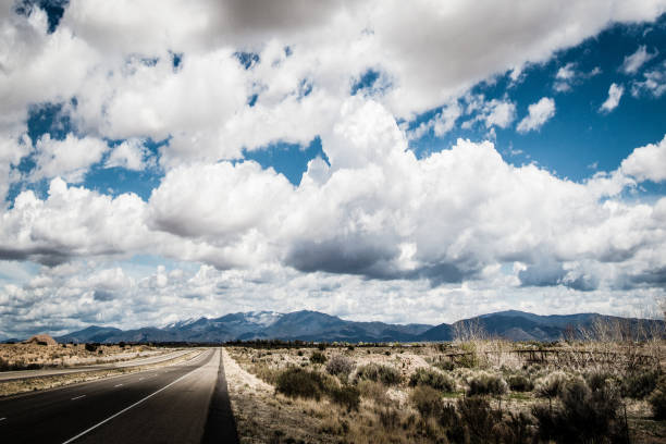 istock Blue Sky and Fluffy Clouds over Southwest Landscape 647959600