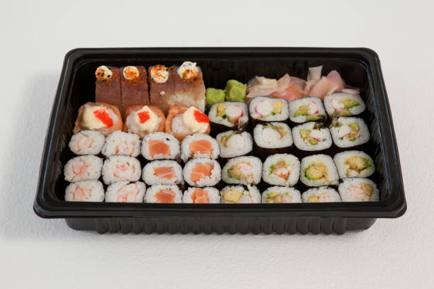 istock Set of assorted sushi kept in a black box 647983234