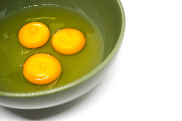 istock Egg yolke in green bowl 647989776