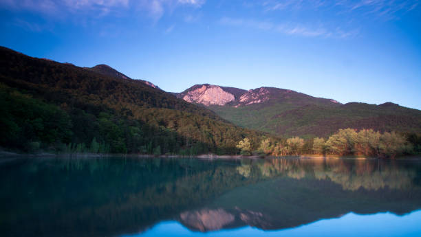 istock lake in the mountains 647990812