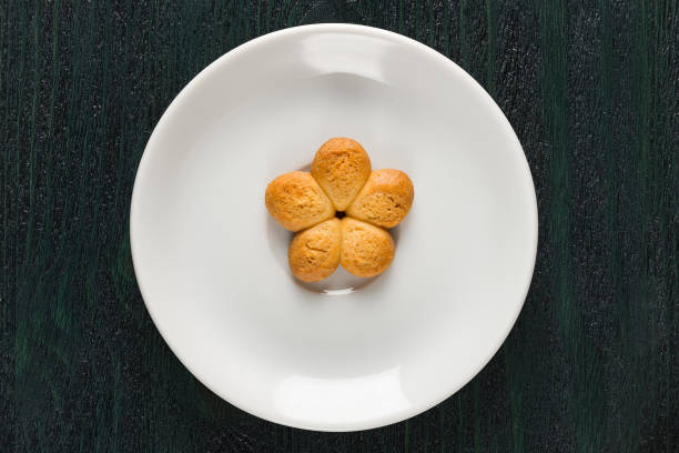 istock cookies on a saucer 647995030