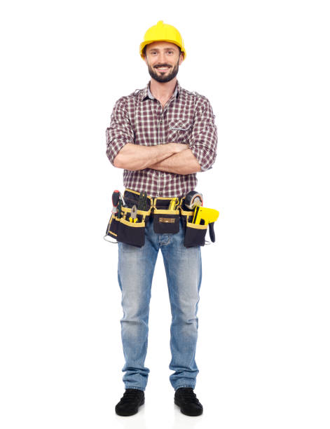 cheerful handyman - manual worker full length isolated on white standing imagens e fotografias de stock