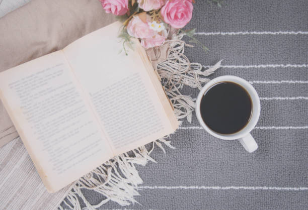 istock relax coffee cup of hot drink and read a book 648004962