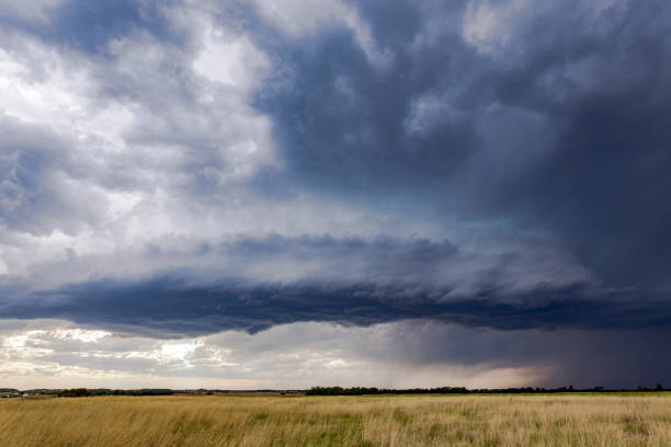istock Severe thunderstorm supercell hovers over farmland 648009192