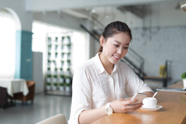 istock young pretty woman relaxes in office 648013424