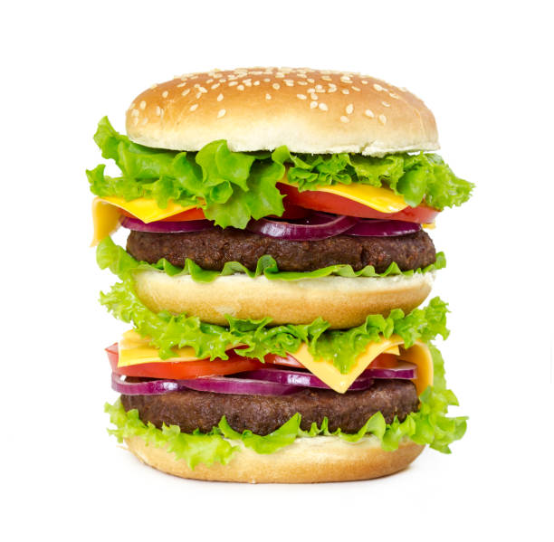 istock Double burger with cutlet, onions, cheese, tomatoes and salad leaves 648035172